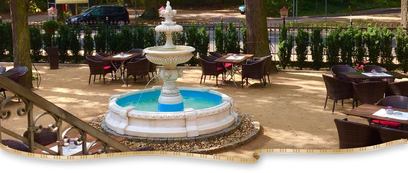Ansicht des Brunnens im Sommergarten des Restaurant Hotel Kronprinz Falkensee
